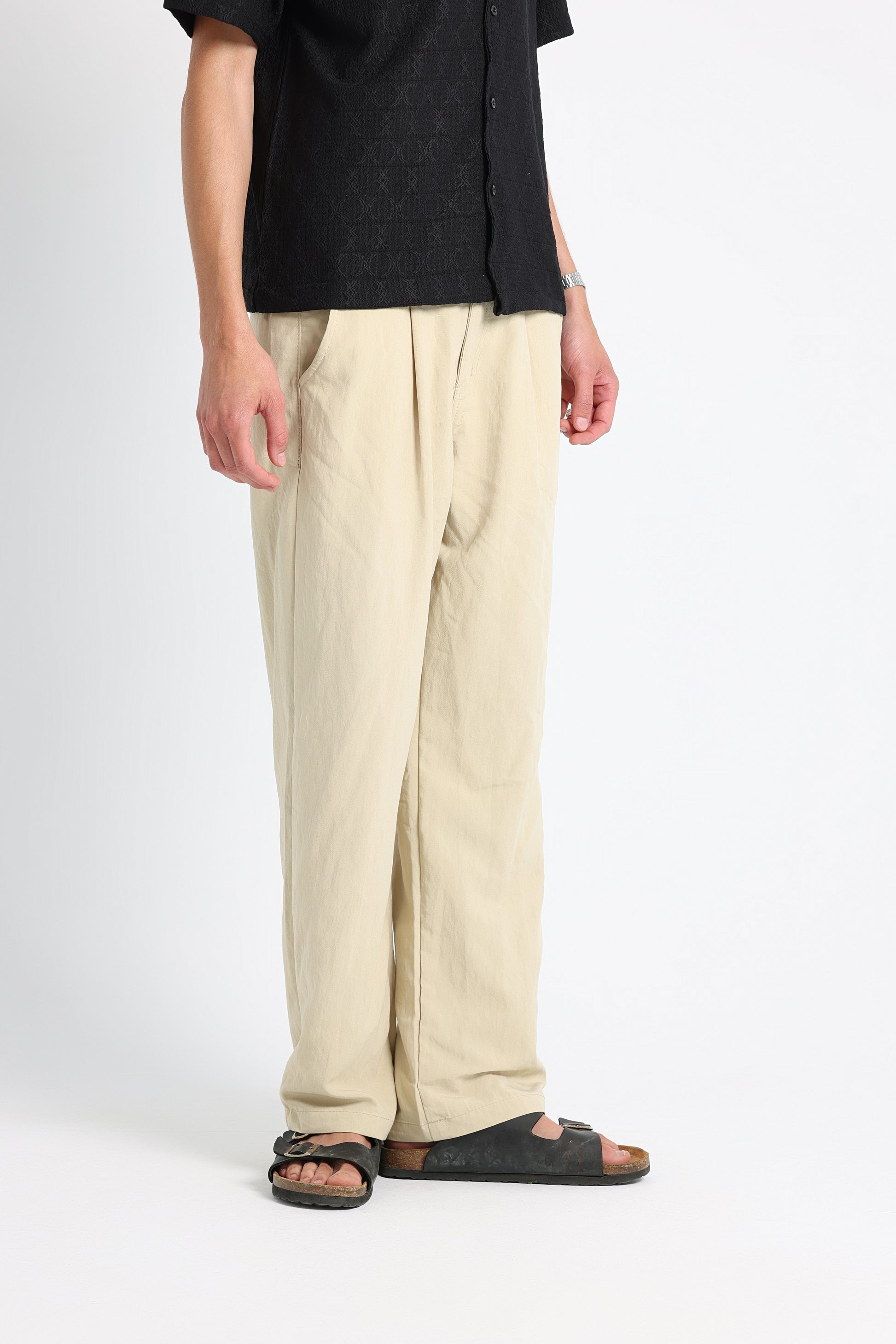 UNTCHD Beige Pleated Trousers